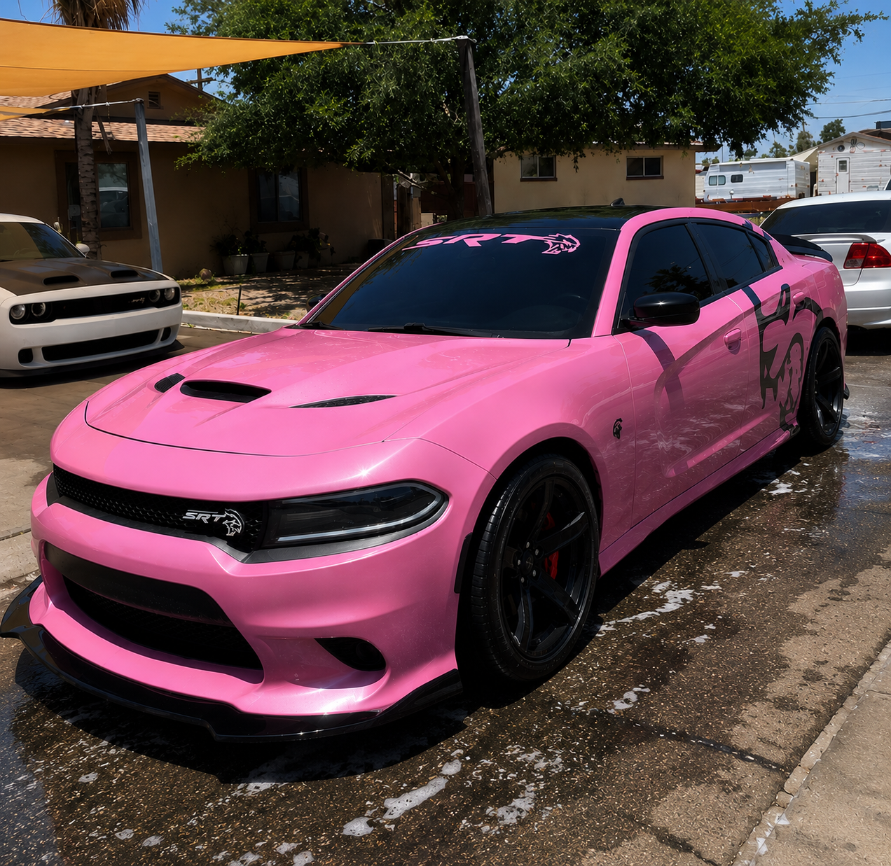 Freshly washed pink Dodge Charger SRT